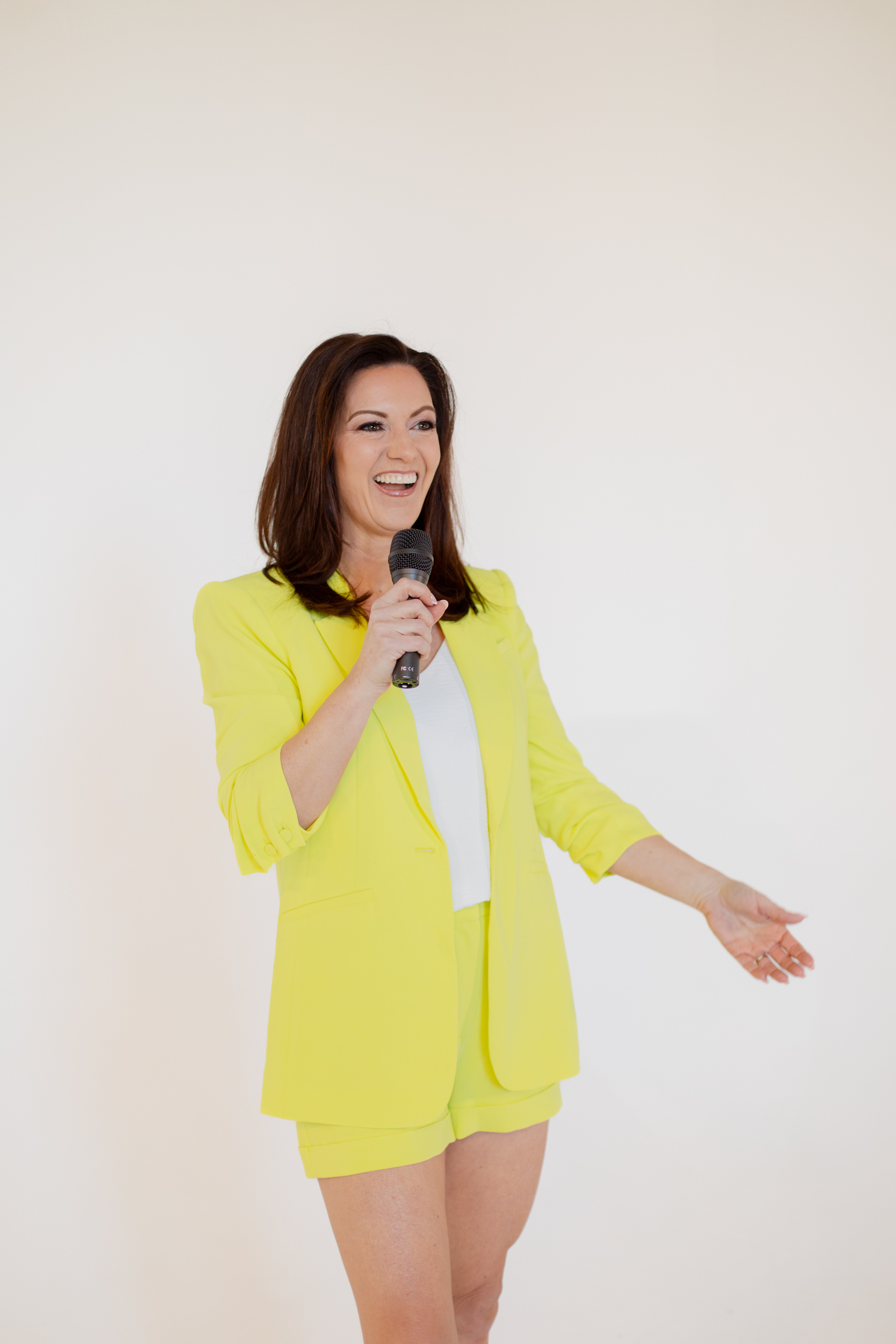 Neeley Neal - female podcast host and motivational speaker
